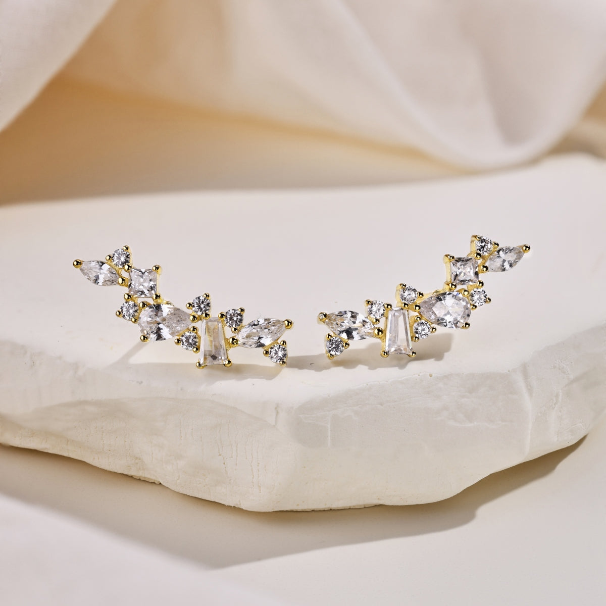 "Starluxe" Drop Ear Jackets One Look. Two Styles. Limitless Glamour.