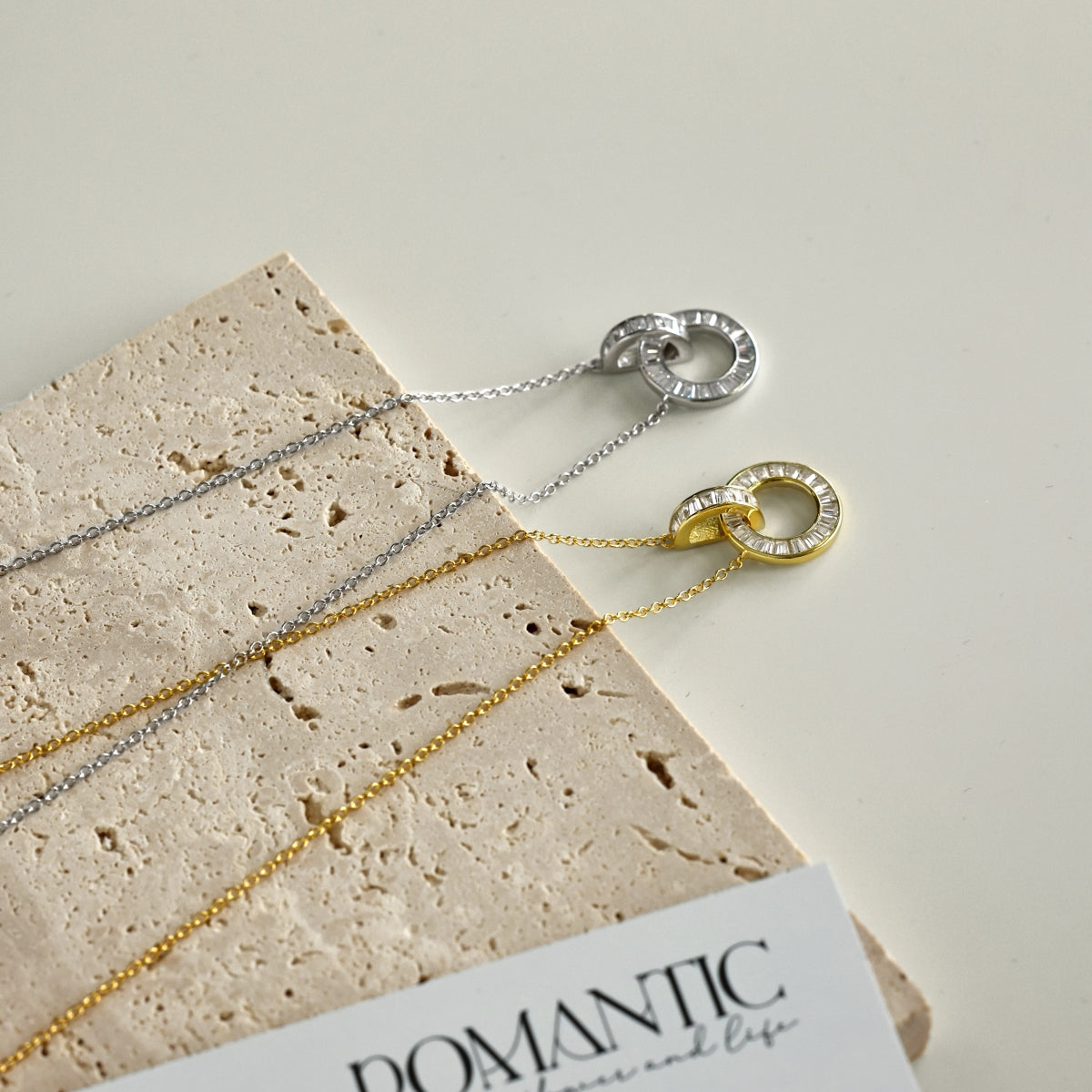 "Linked Brilliance" Necklace Two Shapes. One Meaning. Infinite Spark.