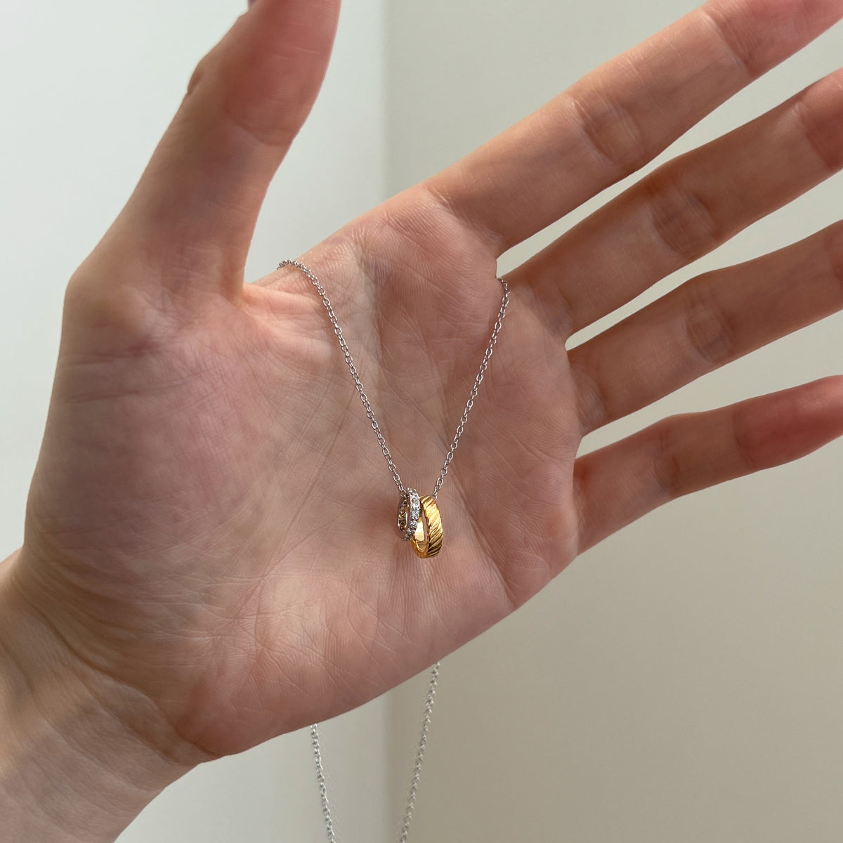 Unity Loop Pendant Necklace – Two Rings. One Bond. Infinite Strength.