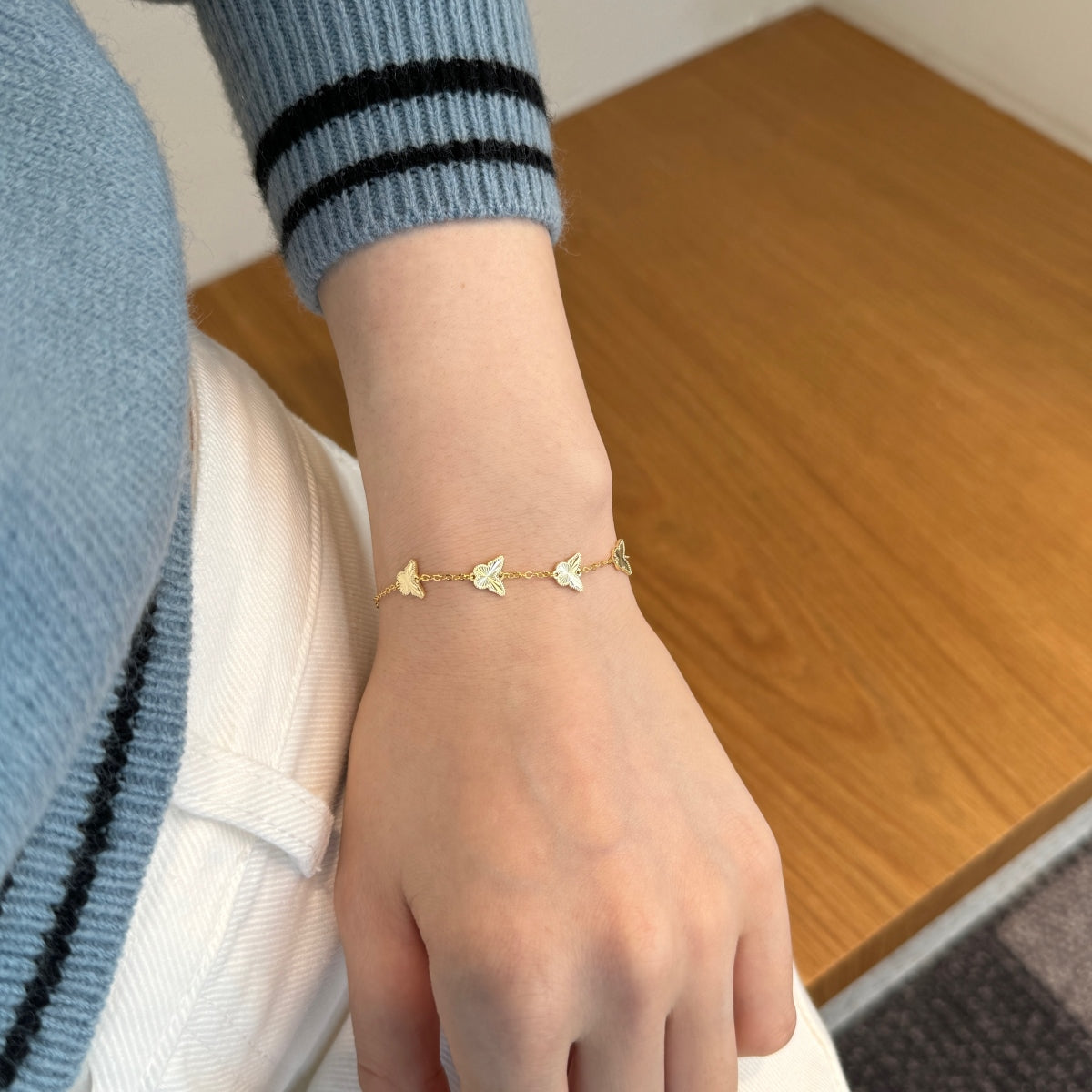 Golden Flutter: 18K Gold-Plated Butterfly Charm Bracelet
