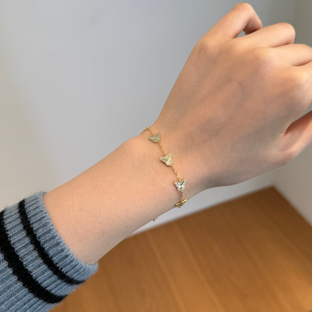 Golden Flutter: 18K Gold-Plated Butterfly Charm Bracelet