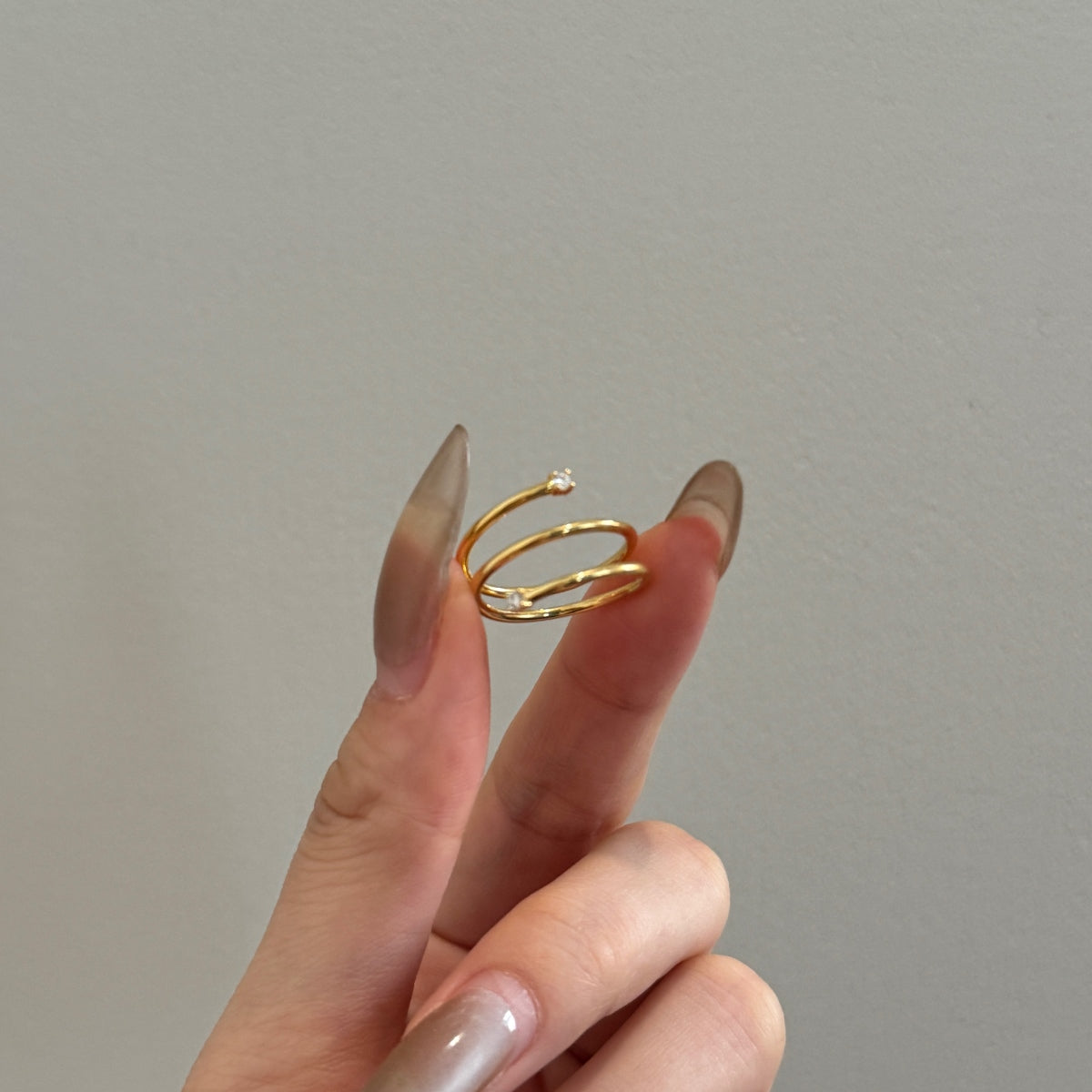 "Twist Glow" Open Ring A Whisper of Gold. A Spark of Light.