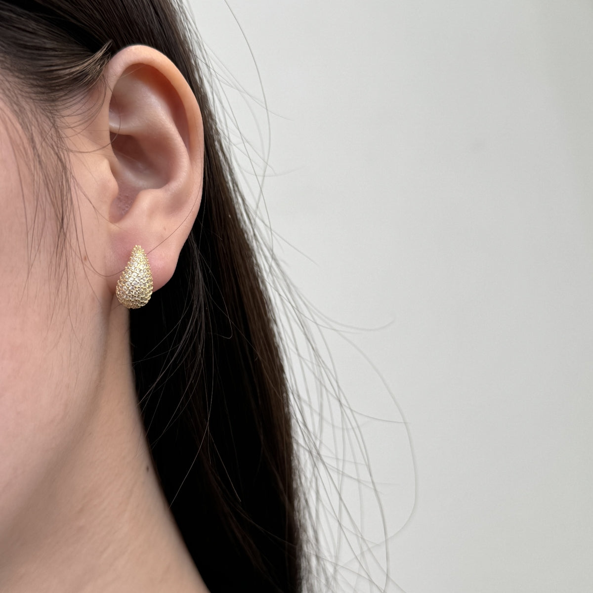 "Elegant Radiance" Teardrop Stud Earrings Sculpted Light. Effortless Glamour.