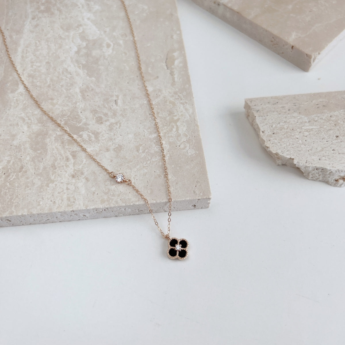 Noir Bloom: Black Enamel Clover Pendant Necklace