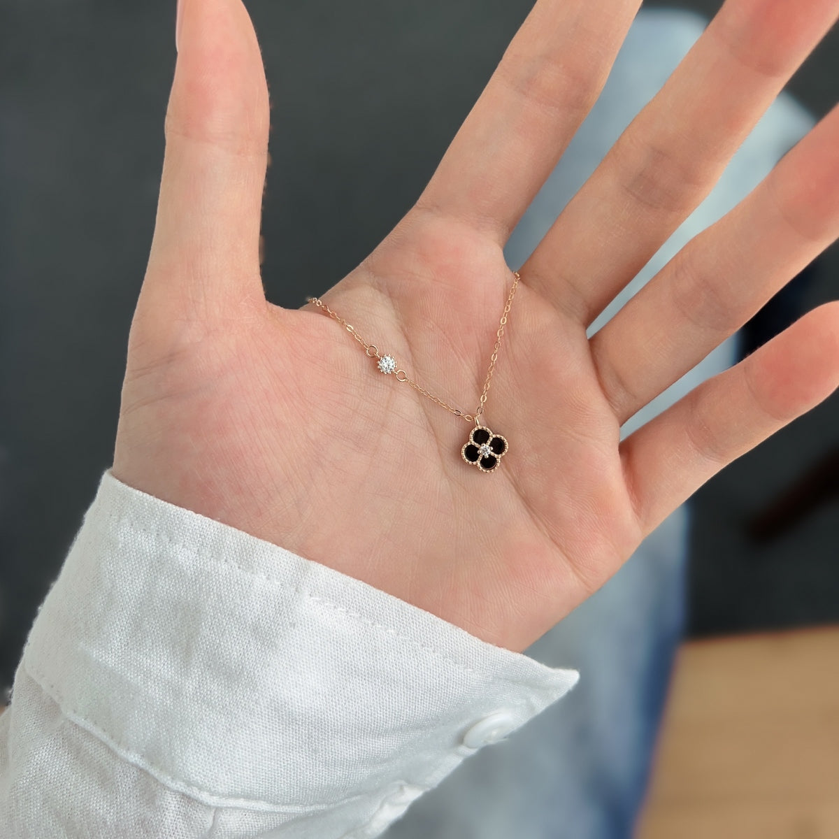 Noir Bloom: Black Enamel Clover Pendant Necklace