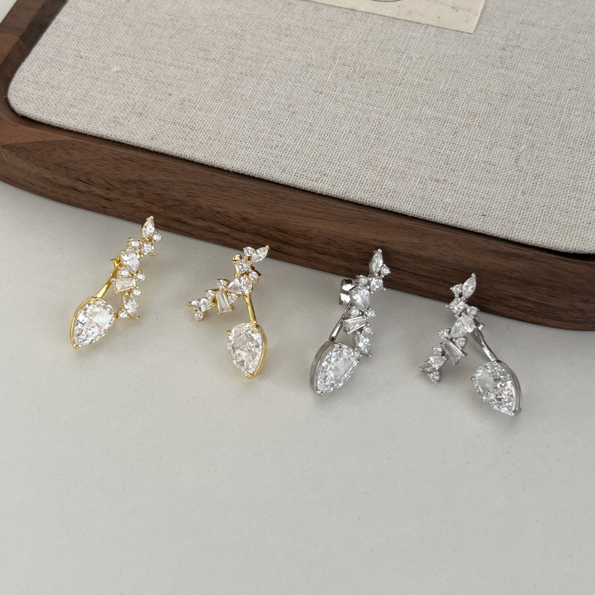 "Starluxe" Drop Ear Jackets One Look. Two Styles. Limitless Glamour.
