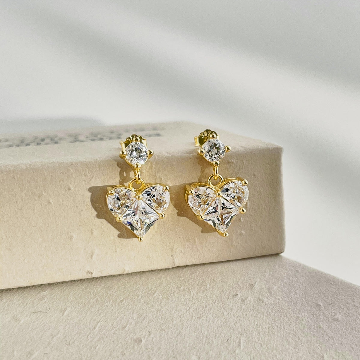 "Lovelure" Dangle Earrings Where Romance Falls into Place.